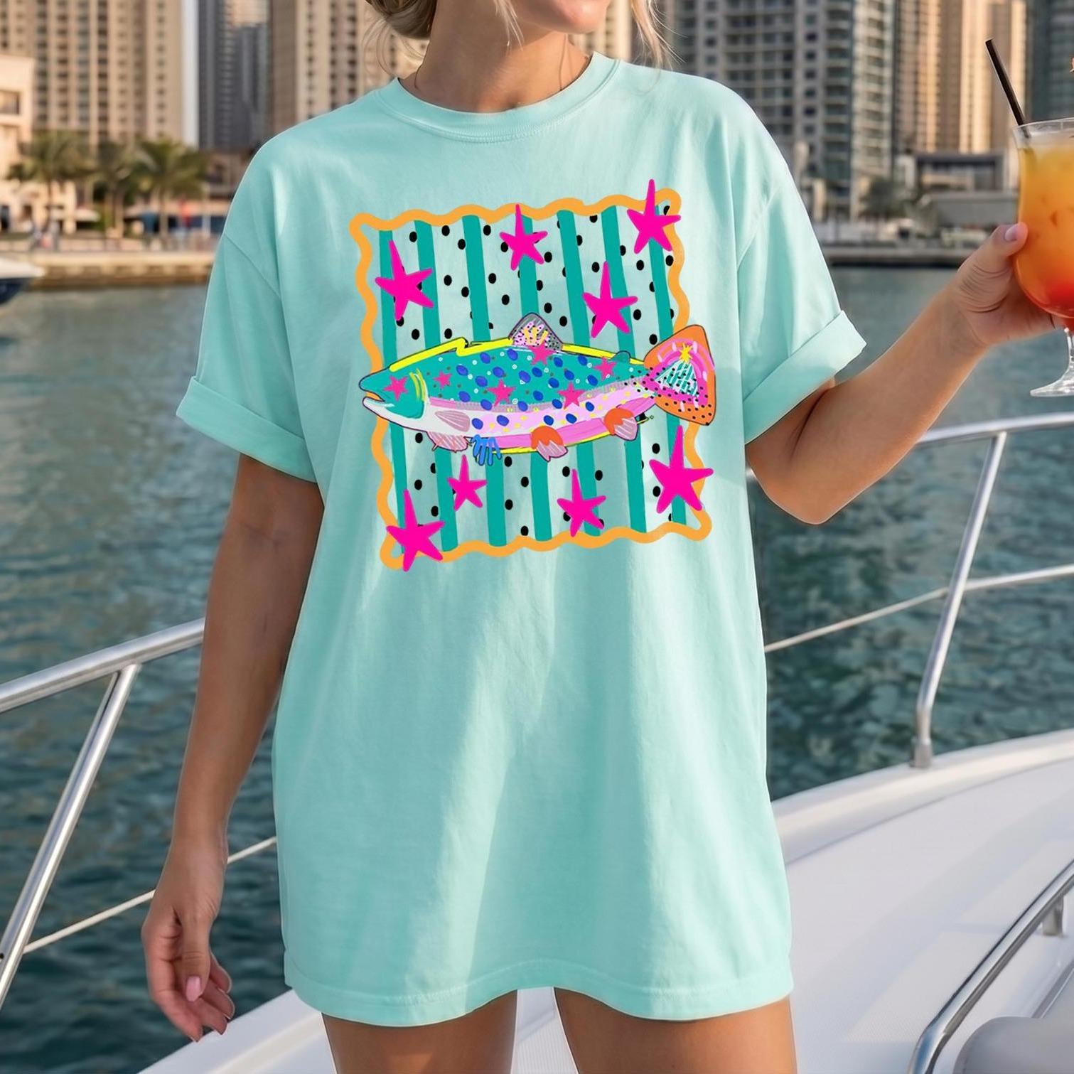 Colorful Rainbow Trout Graphic T-Shirt For Women Preppy Coastal Cowgirl Retro Aesthetic Mint Green Cotton Tee With Pink Stars Stripes & Polka Dot Fish Summer Fishing Vacation Trendy Funky Top