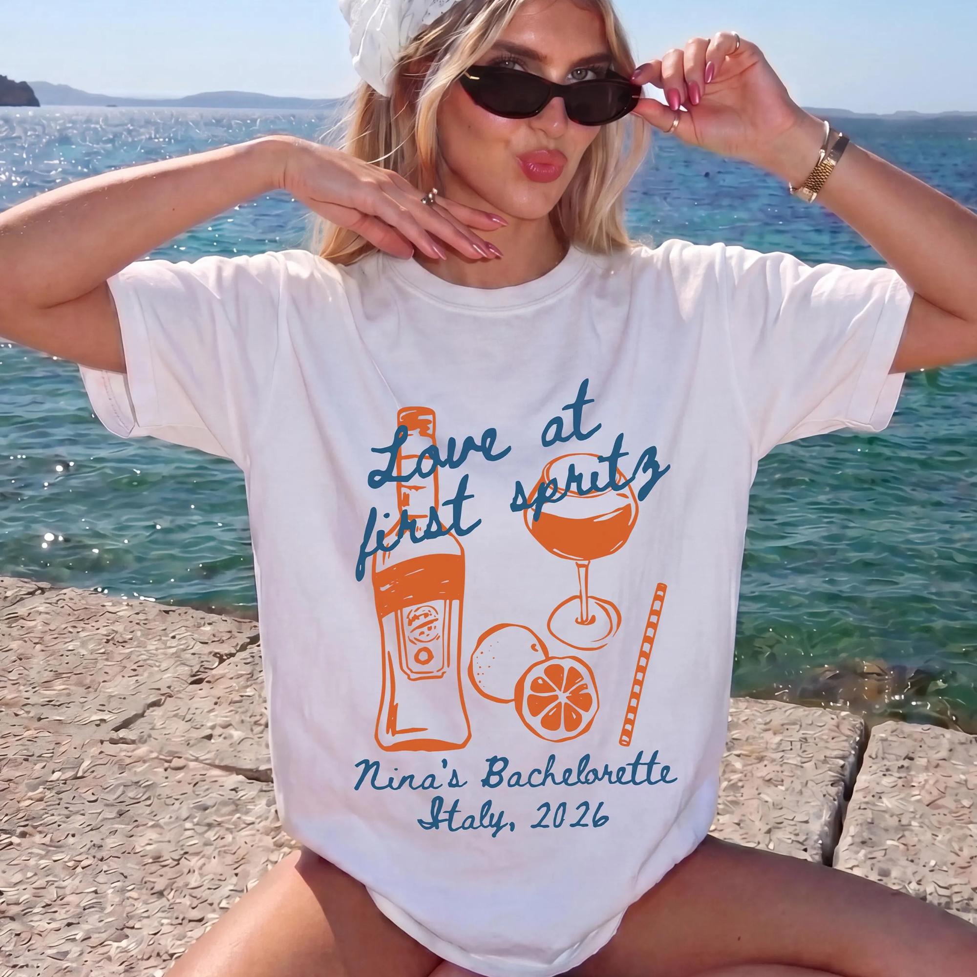 Personalized Love At First Spritz Bachelorette Shirt Graphic T-Shirt For Bride And Bridesmaids Group Matching Custom Preppy Euro Summer Retro Aesthetic Pale Cotton Top Aperol Spritz Bach Party Shirt Italy Cocktail Tee Summer Bach Trip Top