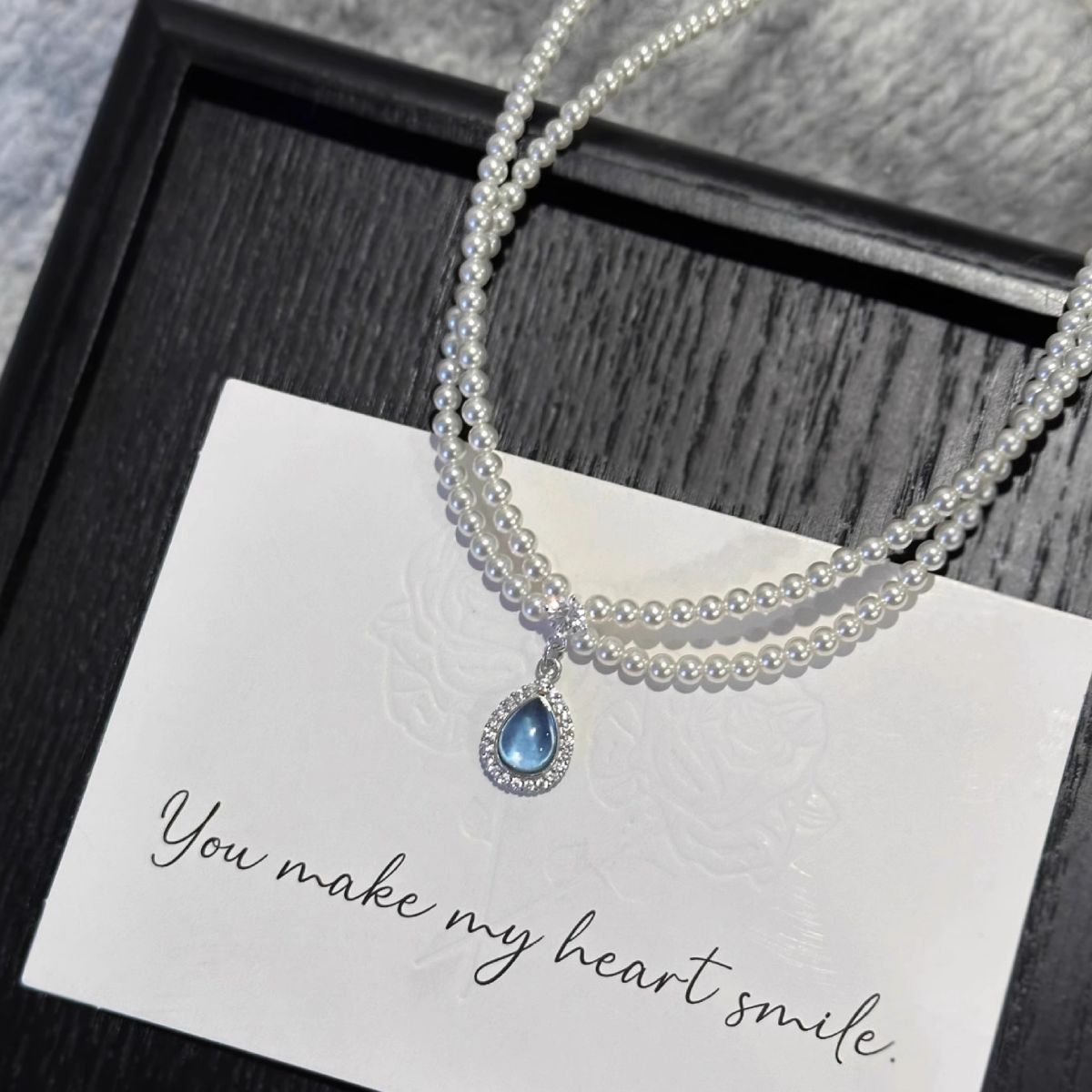 Double Layered Pearl Necklace With Teardrop Pendant