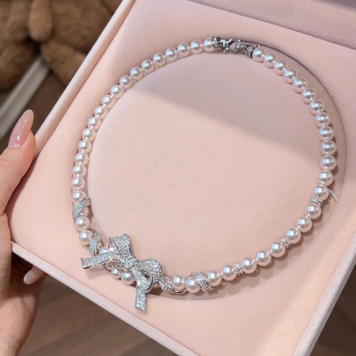 Pearl Necklace With Bow Pendant